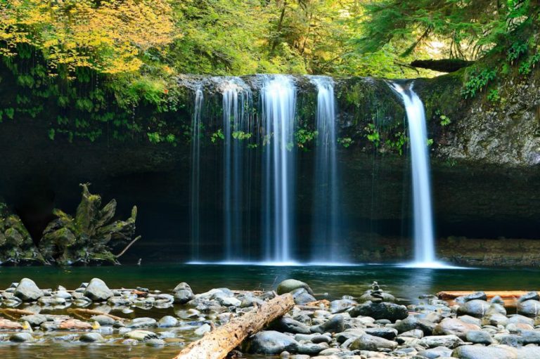 Waterfall - long-exposure photo of lake with waterfall at daytime