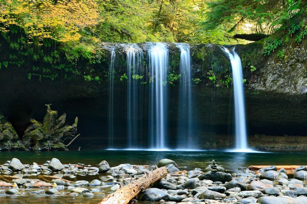 Waterfall - long-exposure photo of lake with waterfall at daytime