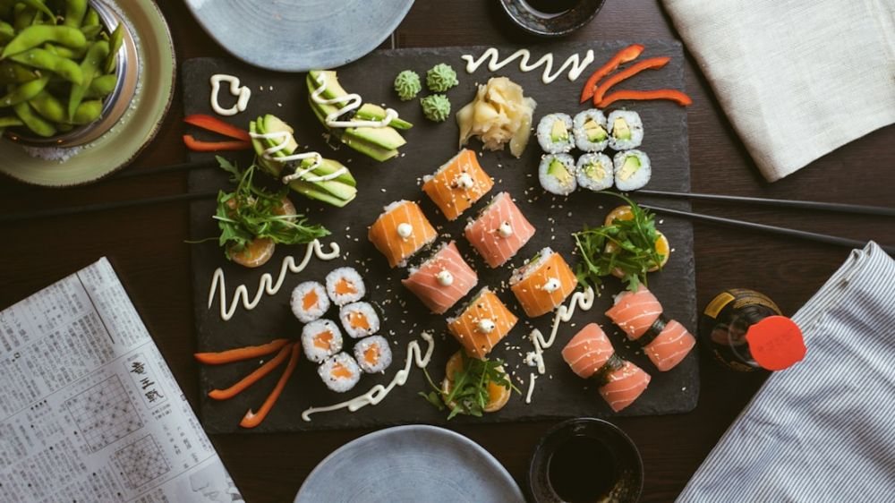 Maori Cuisine - sushi on black ceramic plate