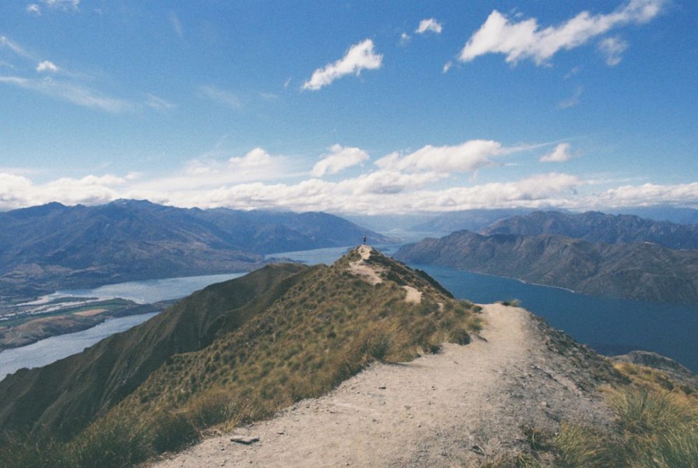 Eco-tourism New Zealand - photography of mountain near body of water