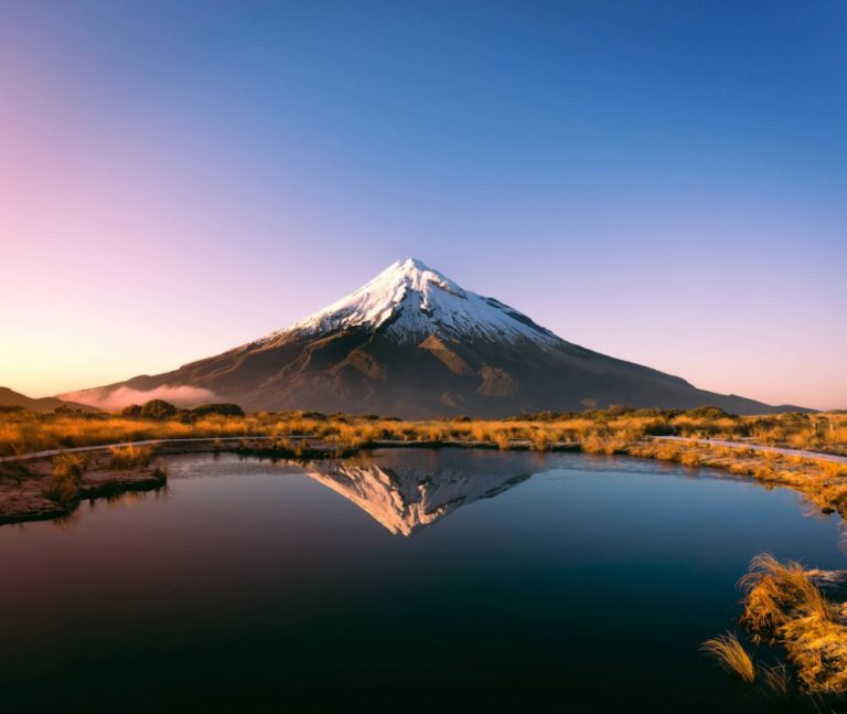 New Zealand - mountain near body of water during daytime