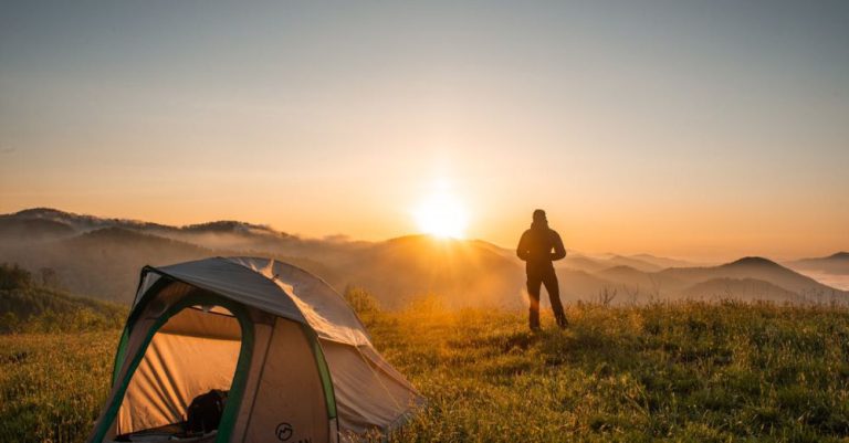 Hiking Camping - Silhouette of Person Standing Near Camping Tent