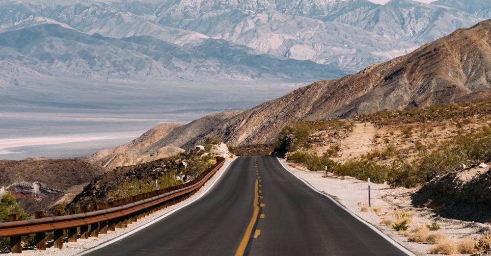 Scenic Drive - Empty Gray Road Under White Clouds