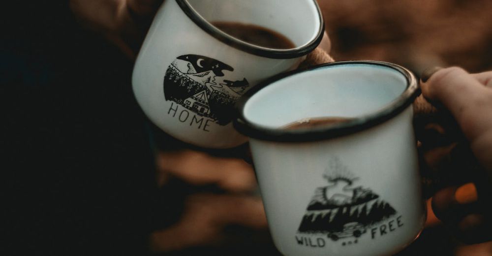 Day Hikes - Person Holding White and Black Ceramic Mug