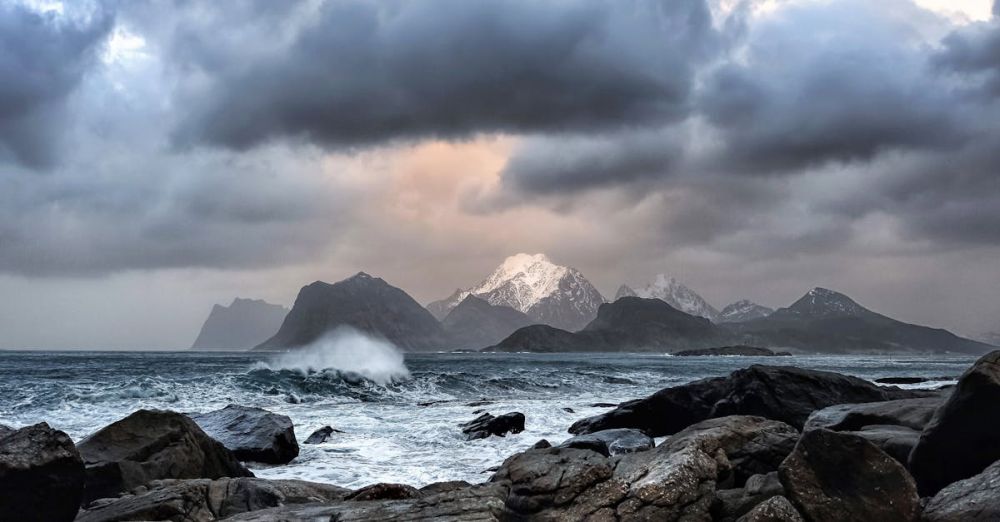 Coastal Trails - Waves Crashing on Rock Near Mountains during Datyime