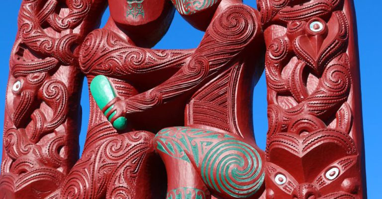 Maori Carvings - Red Maori Statue Under Blue Sky