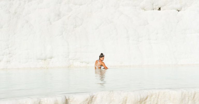 Geothermal Baths - Woman Bathing in Pamukkale Travertine Terraces Pools