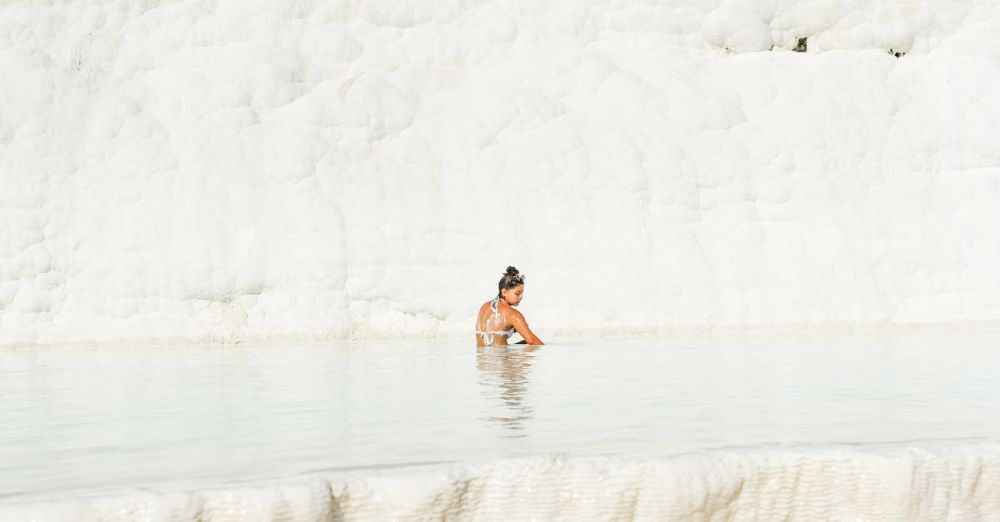 Geothermal Baths - Woman Bathing in Pamukkale Travertine Terraces Pools